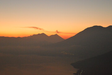 Sunrise over the volcanoes of Lake Atitlan in Guatemala, Central America