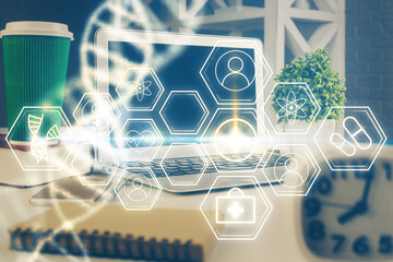 Desktop computer background and DNA drawing. Double exposure. Science concept.