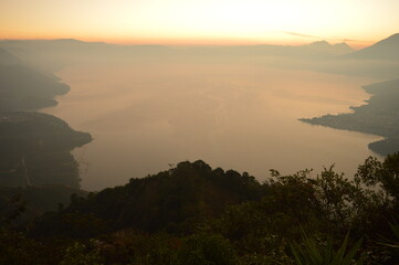 Sunrise over the volcanoes of Lake Atitlan in Guatemala, Central America