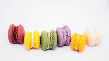 pastel colored macarons isolated on white background.