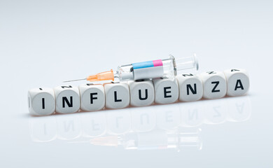 Grippe Impfen, Spritze auf Würfel