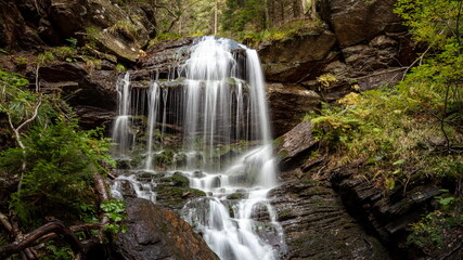 Fototapeta na wymiar Waterfall in a forest, near Keprnik mountain, Jeseniky - Czech Republic