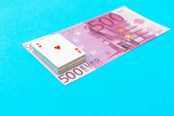 500 Euro With One Note and small playing cards lie on banknote
