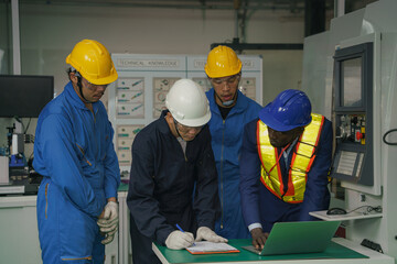 factory technician, foreman and workers in technical discussion