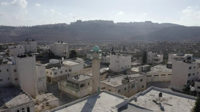Old Mosque in Beit hanina (Abu Dahuk) the old city -aerial 
Palestine town Northwest East Jerusalem Close to Ramot , Israel
