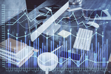 Multi exposure of graph and financial info and work space with computer background. Concept of international online trading.