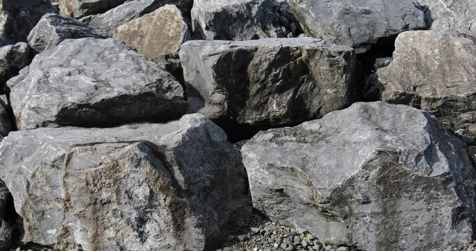 gray pebbles as backfilling a wall