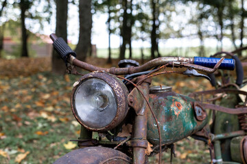 Fototapeta na wymiar Old, rusty Soviet motorcycle
