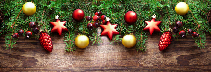 Fototapeta na wymiar Christmas background toys and Christmas branch on vintage desk