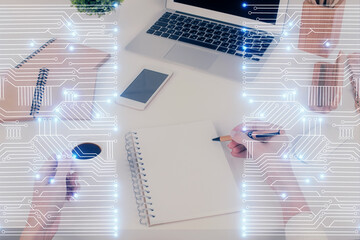 Technology theme hologram over woman's hands taking notes background. Concept of Tech. Double...