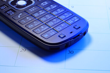 携帯電話とカレンダー