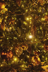 Christmas tree, decorated with light garland and toys