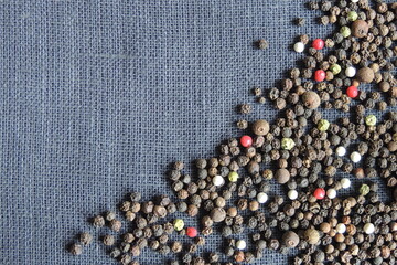 pepper spices on the black background