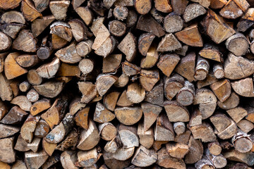 Chopped firewood stacked together. Fuel.