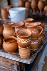 Earthenware on the table. Folk art.