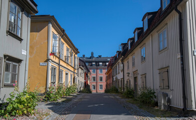 Obraz premium Old houses on the island Djurgården a sunny day