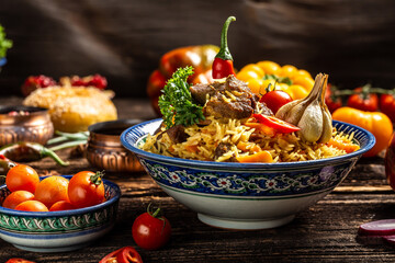 Uzbek and Central Asia cuisine concept. Assorted Uzbek food pilaf samsa lagman manti shurpa Uzbek restaurant concept Uzbek food. Food recipe background.