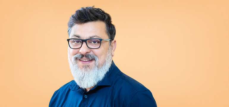 Portrait of happy mature mixed race business man