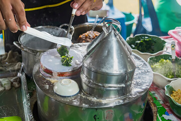 Selective focus of Thai steamed rice-skin dumplings or khao kriap pak maw is tow popular and unique Thai street food snacks.