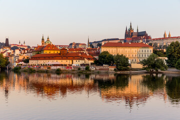Fototapeta na wymiar Panorama of Prague at sunrise over the Vltava River, Czech Republic
