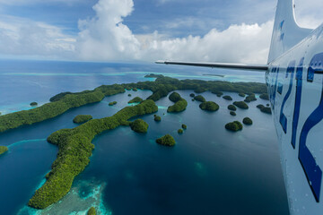 Aerial view from small aircraft flying over Rock islands of Palau