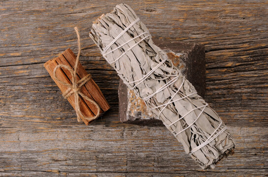 White Sage Smudge And Sticks Palo Santo On The Wooden Background.