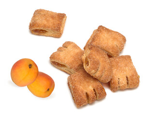 Puff pastry, Goose Feet cookies with apricot filling on white background