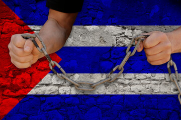 male hands breaking the iron chain, symbol of tyranny, protest against the background of the...