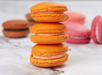 stack of baked macarons on a white table