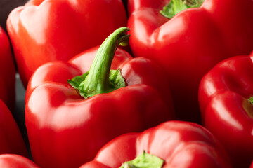 Red bell peppers background. Top view