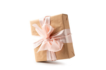 Brown craft gift box with red ribbon bow isolated on white background. Clipping path