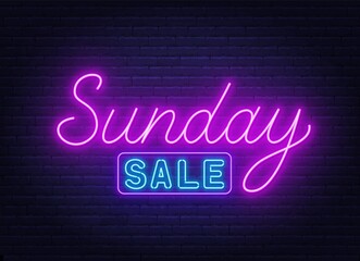 Sunday Sale neon sign on brick wall background .