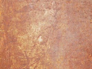 Old rusty metal sheet. Brown with streaks of a rusty wall of the garage.