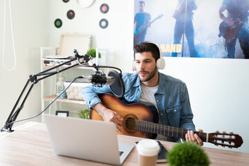 Musician recording a song in studio