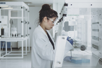 Female scientist conducting an experiment in a laboratory