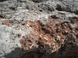 Textured rough hard natural rock closeup detail