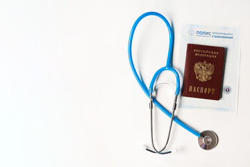 Medical services in Russia, the stethoscope is on the medical policy and passport