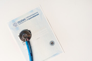 Medical services in Russia, the stethoscope is on a medical policy