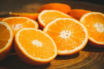 Bunch of fresh sliced oranges on a tray