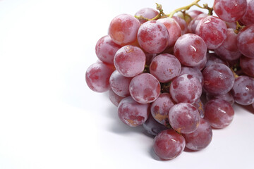 fresh grape fruit on white background with copy space 