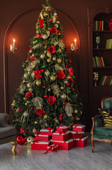 New Year decorated interior in vertical orientation - brown room with Christmas decoration - fir-tree, retro sofa, gift boxes and bookshelf - hoilday celebration photo