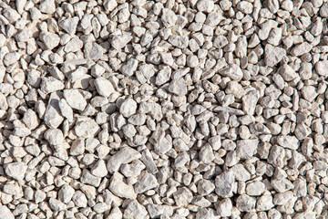 Stone gravel at a construction site as a background.