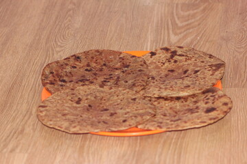 Traditional paratha - Macro closeup with selective focus of homemade oily bread
