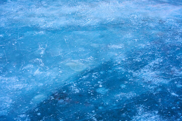 Fototapeta na wymiar Ice Background on a Lake in Winter with Snow