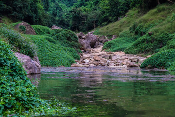 River flows over rocks in this beautiful scene