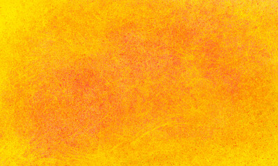 grunge bright abstract yellow orange grainy shabby scratched background. The effect of an old scratched surface. Universal background for banners, brochures, cards, flyers.