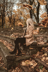 person sitting on a bench in the park