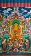 Fototapeta premium CHAME, NEPAL - APRIL 30, 2020: Old buddhist fresco at the gate of Chame village in Annapurna Circuit - most popular tourists trek in Himalayan mountain massive in Nepal on 30 April 2020
