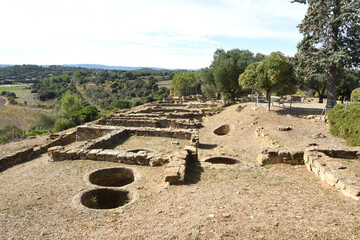 Silos of ruins of the Iberian settlement of Ullastret, Girona province, Catalonia, Spain,
