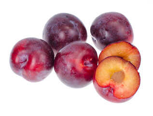 Ripe round sweet plum on white background